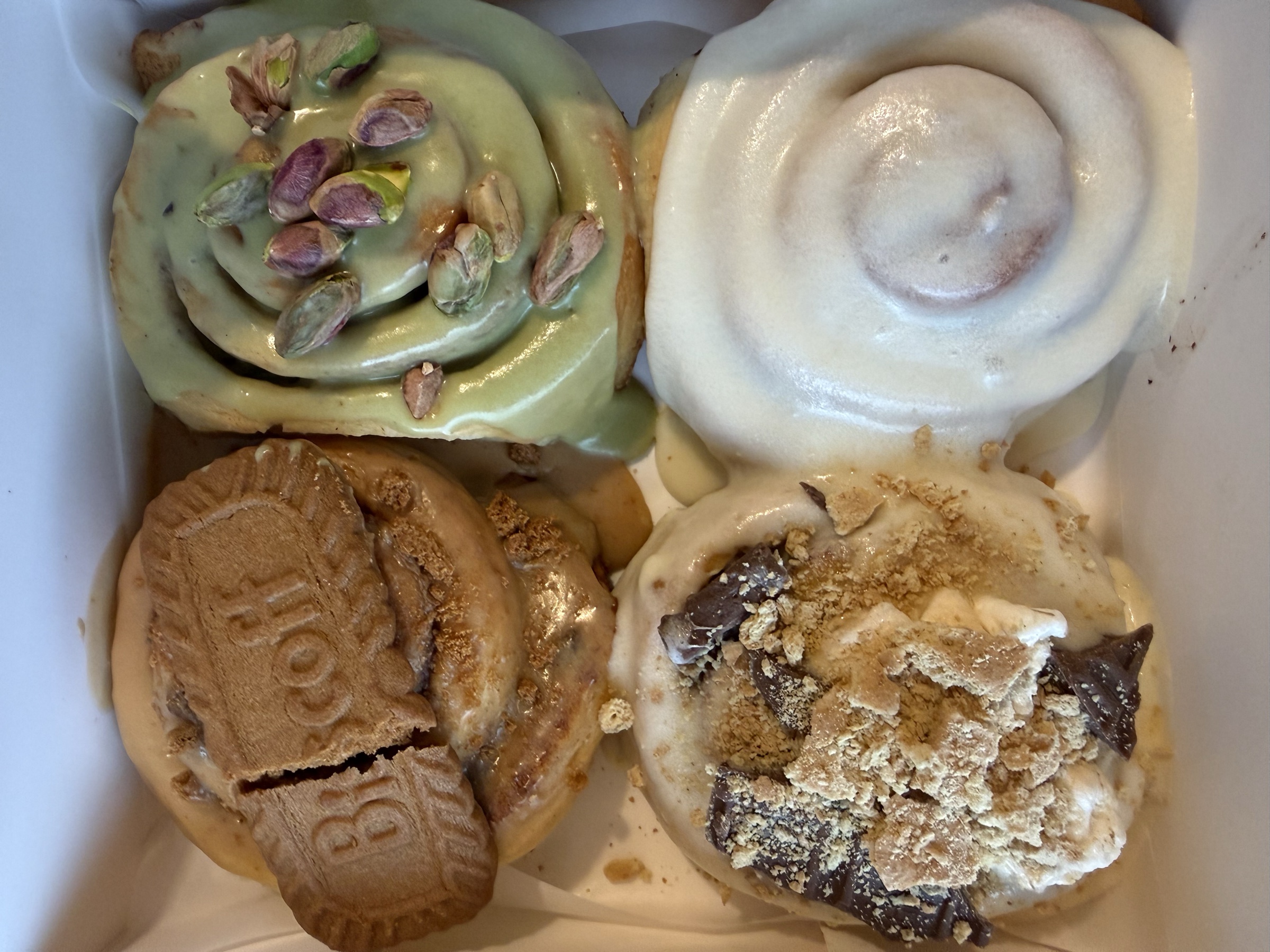 Close-up of Glaze cinnamon rolls with frosting