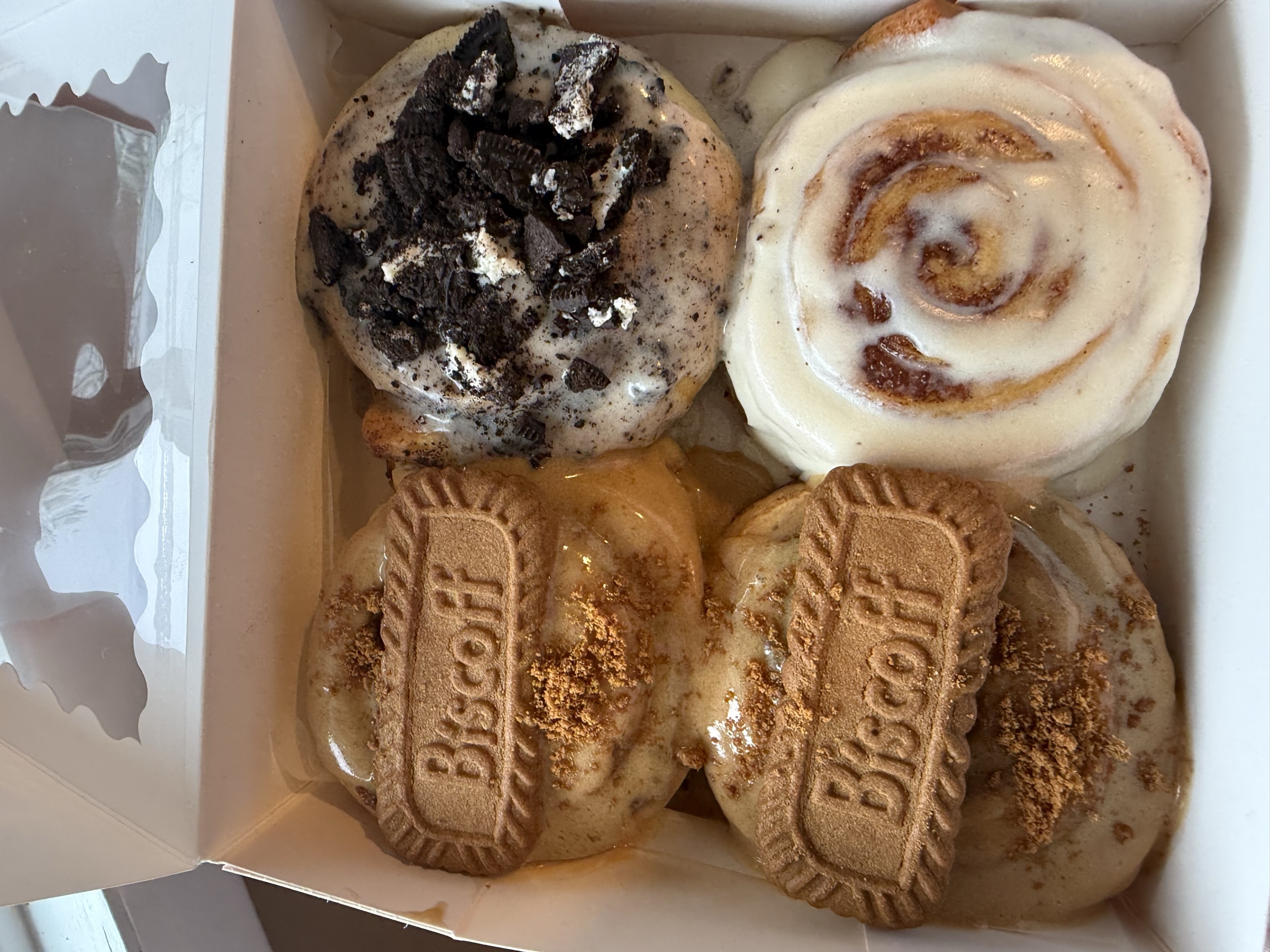 Assorted Glaze rolls with frosting and toppings