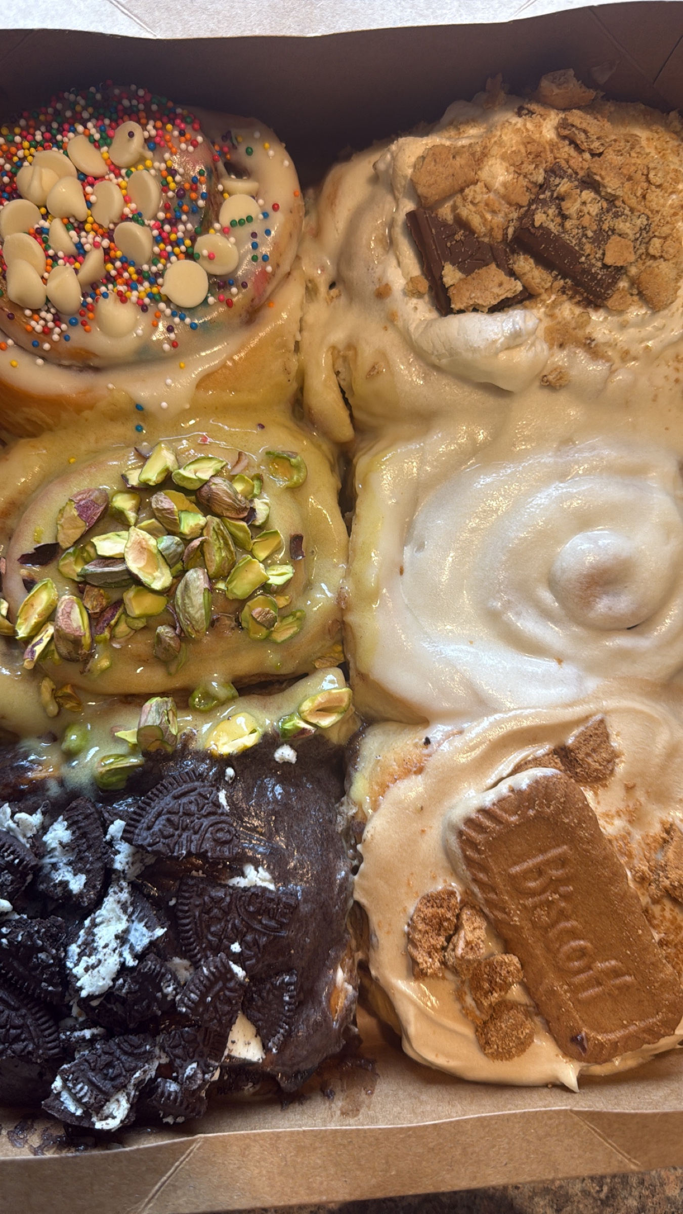 Assorted Glaze roll flavors in a box